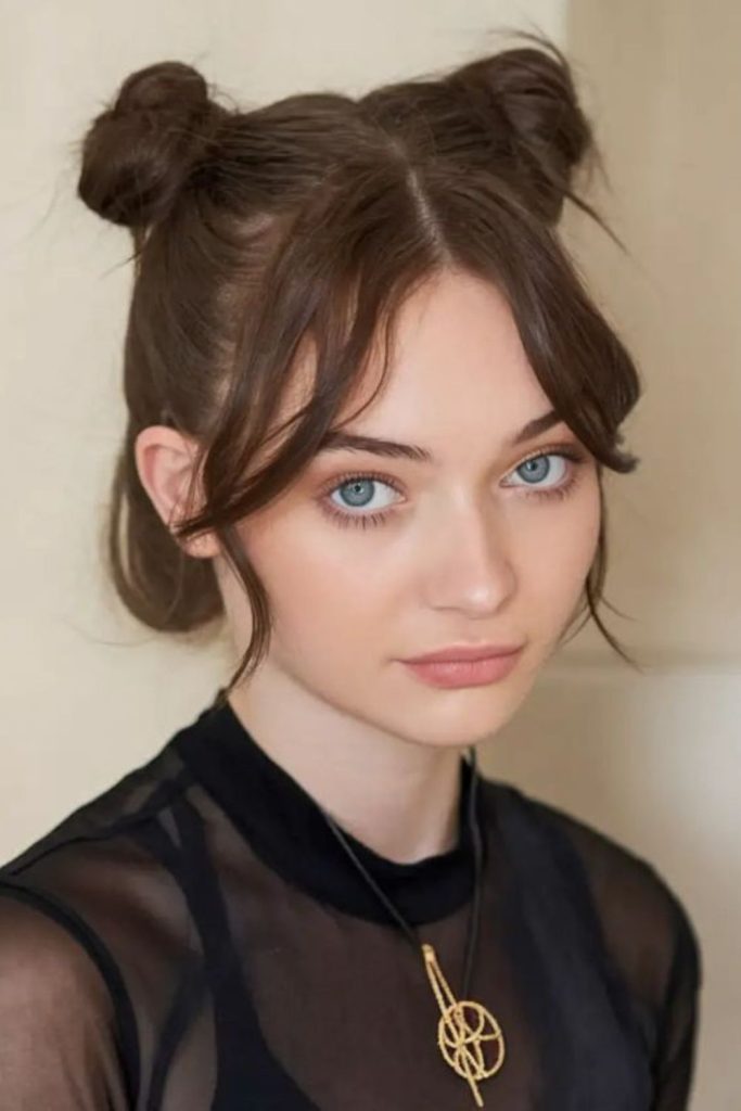 Mini space buns on short hair.
