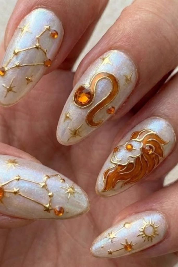 Minimalist gold Leo symbol nails