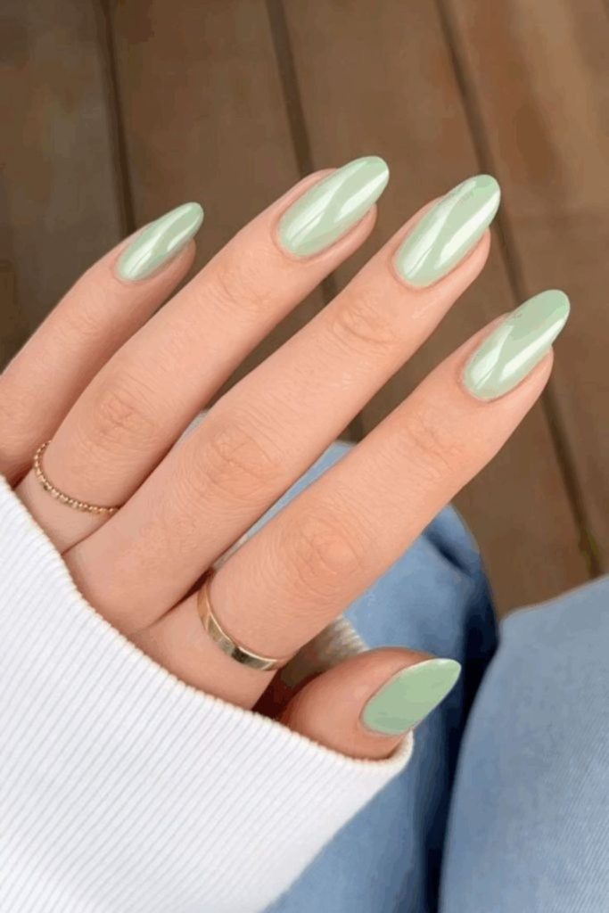 Fresh mint green glossy manicure style.