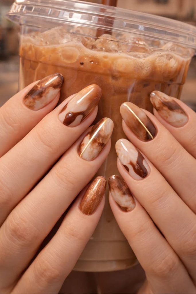 Mocha latte swirl nail design.