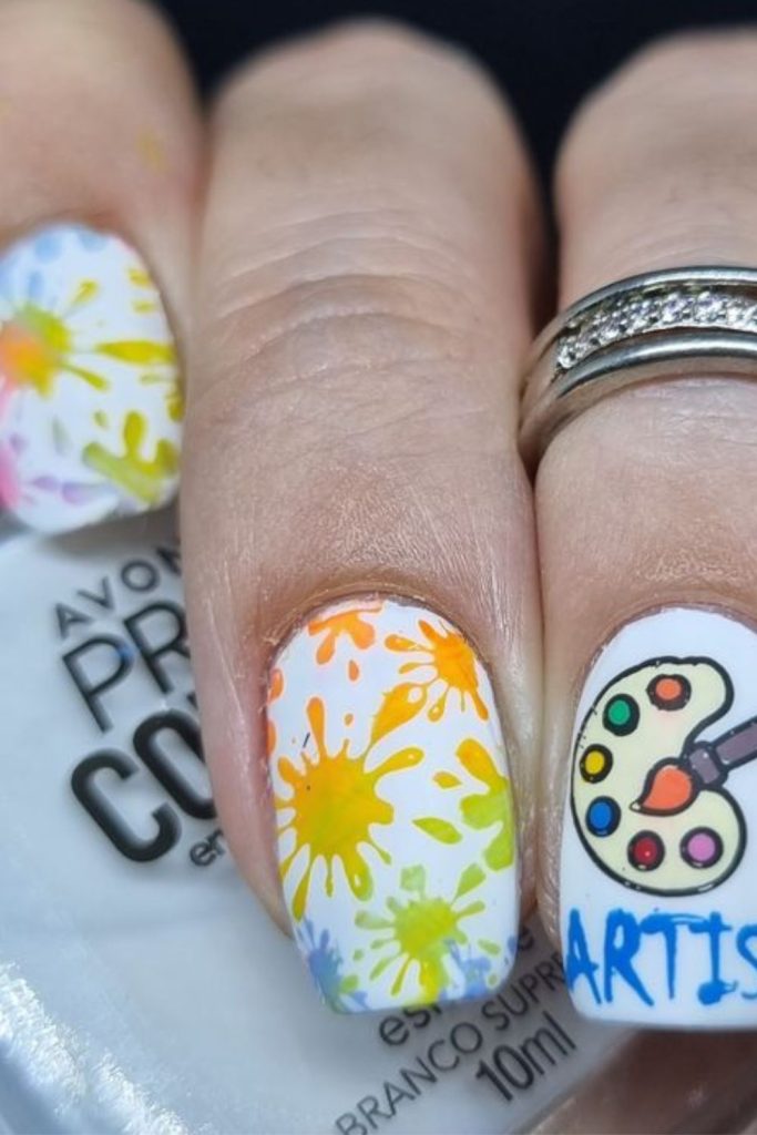Colorful paint palette nail design.