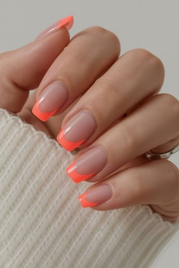 Nude nails with neon tips.
