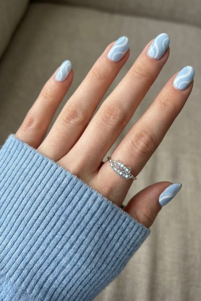 Notebook paper nails with blue lines.