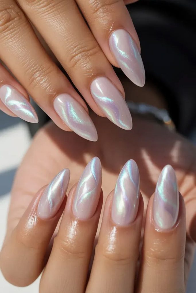 Opal mermaid nails with iridescent chrome.