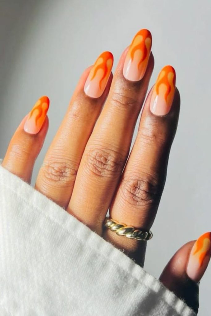 Orange flame French Leo nails