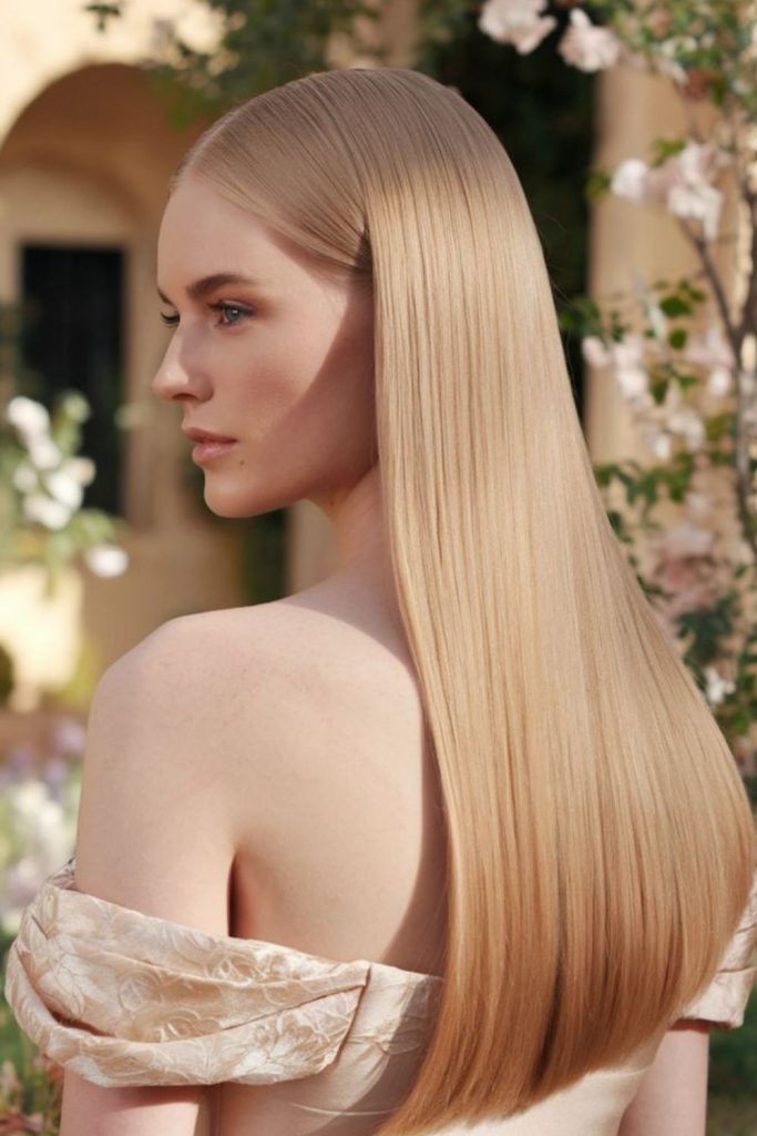 Pearl beige sleek straight hairstyle.