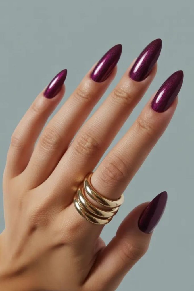 Plum velvet glossy elegant nail style.