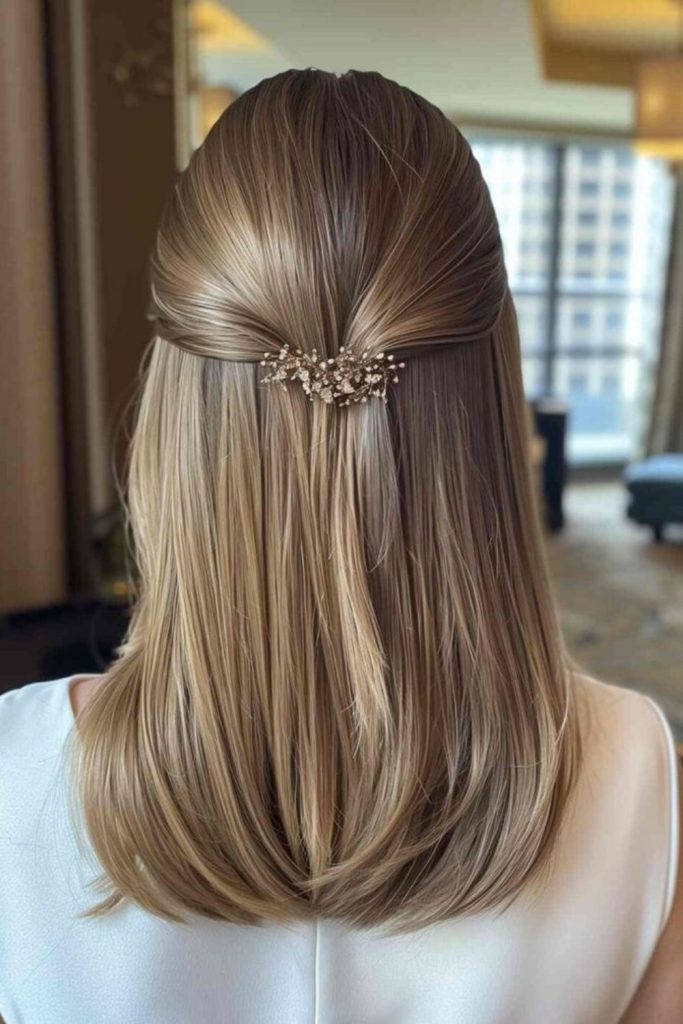 Regal long satin straight hairstyle.