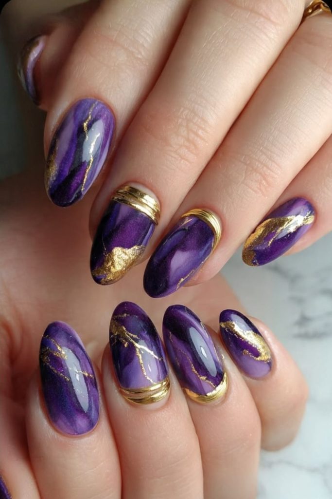 Royal purple golden Leo nails