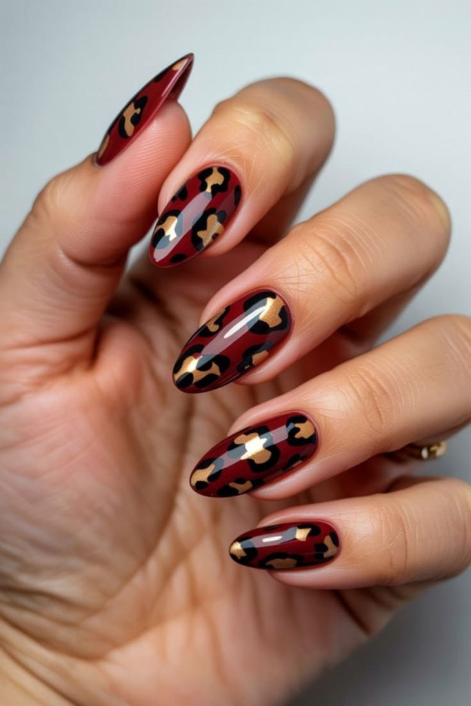 Royal red golden Leo nails