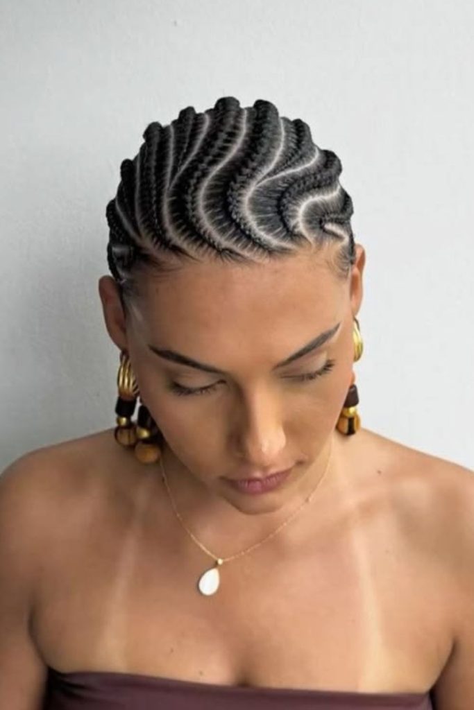 Stylish S-shaped designer cornrow braids.