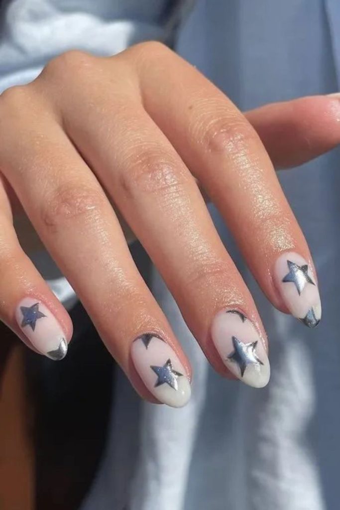 Silver star patriotic nude nail design.