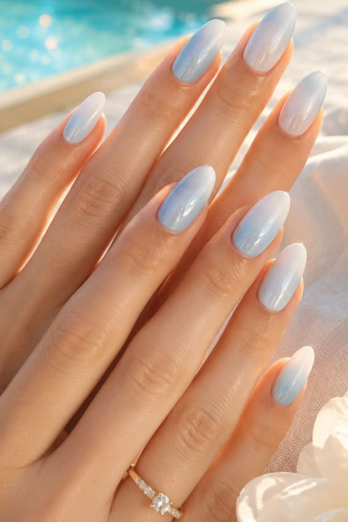 Sky blue ombre nail design.