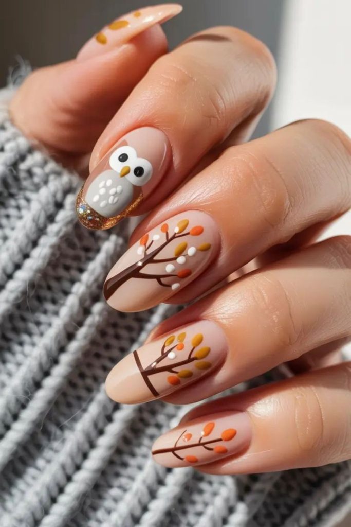 Cute owl teacher autumn nail design.