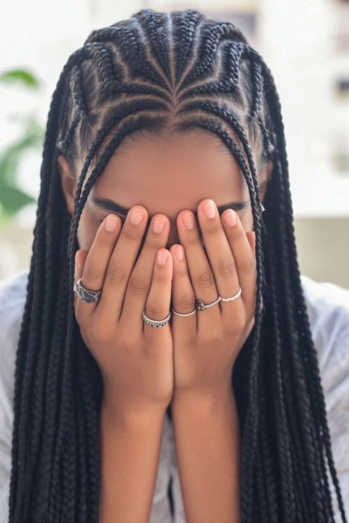 Snake wave flowing natural cornrows hairstyle.