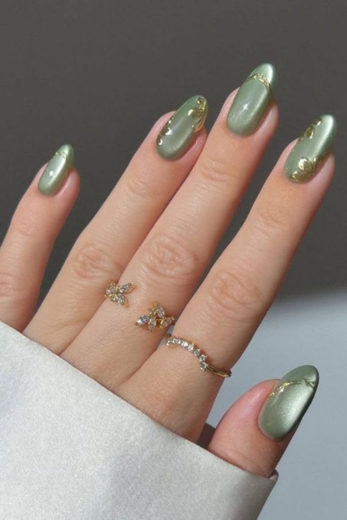 Matte sage botanical nail design.