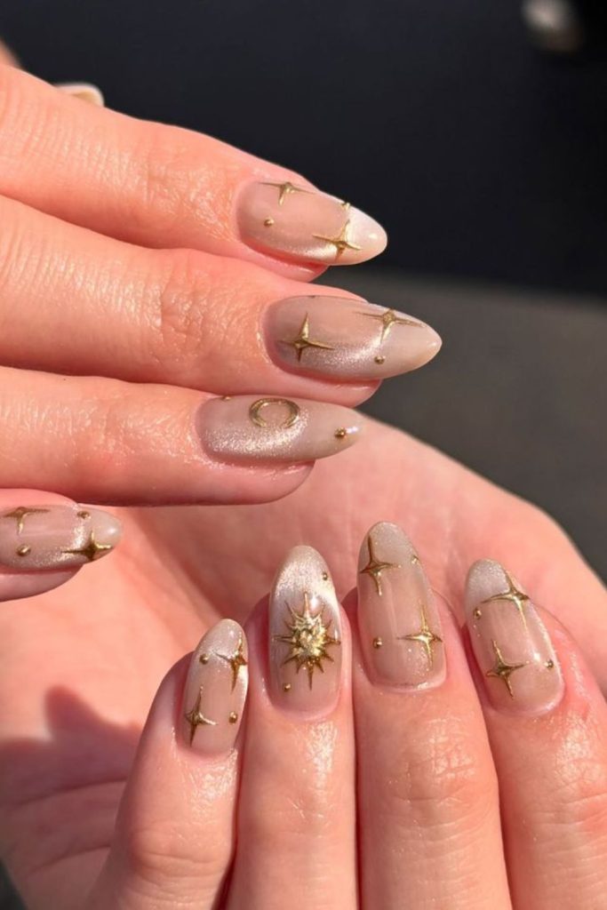 Elegant golden sun goddess nails