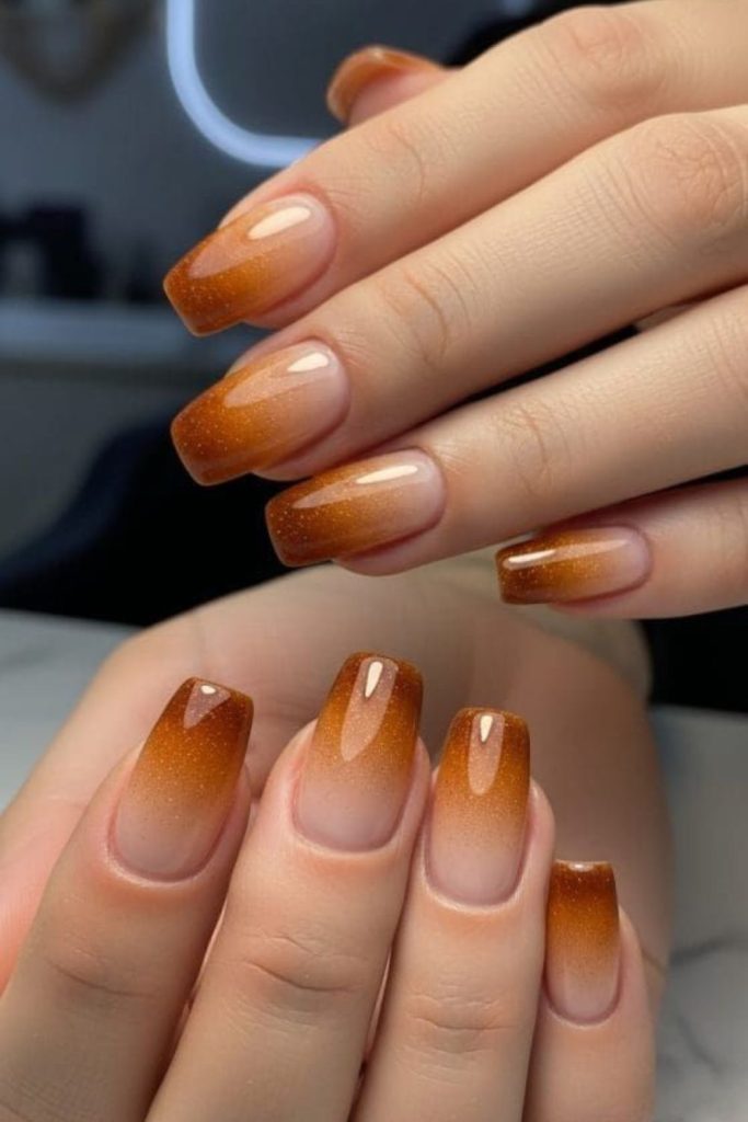 Sun-kissed amber French tip nails