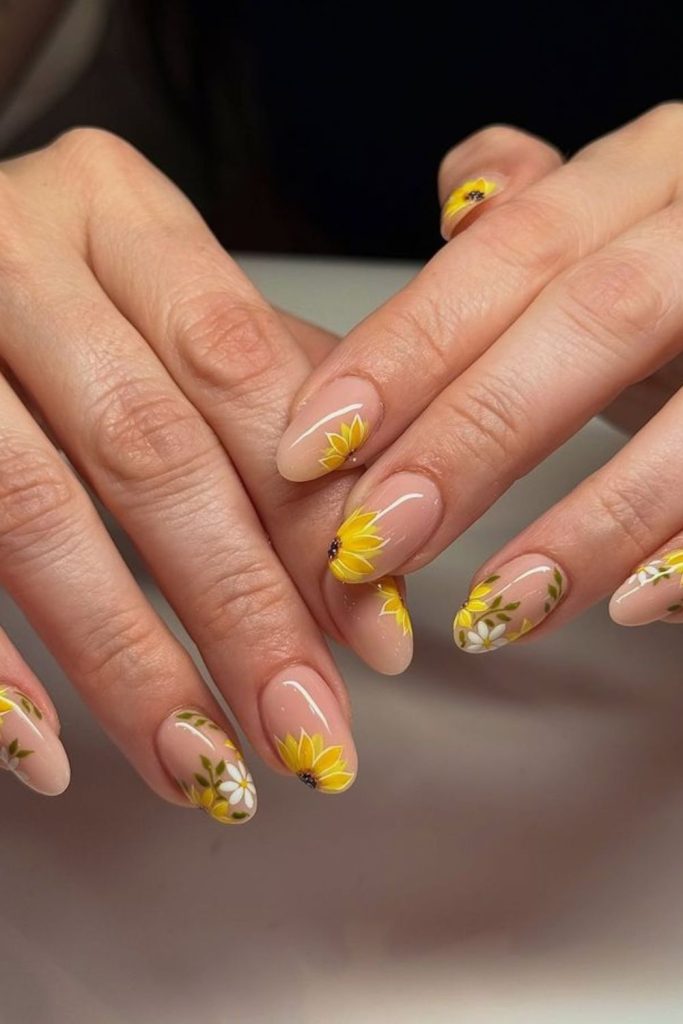 Sunflower floral yellow nail art.