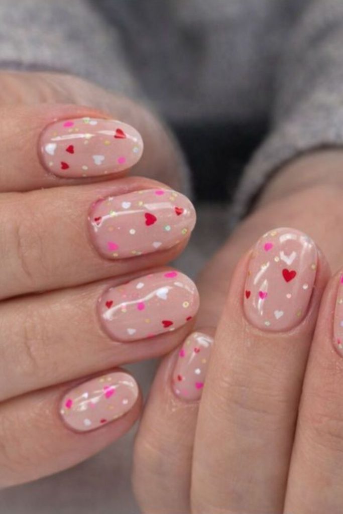 Tiny heart teacher appreciation nails.