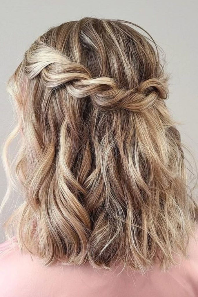 Twisted crown half-up hairstyle.