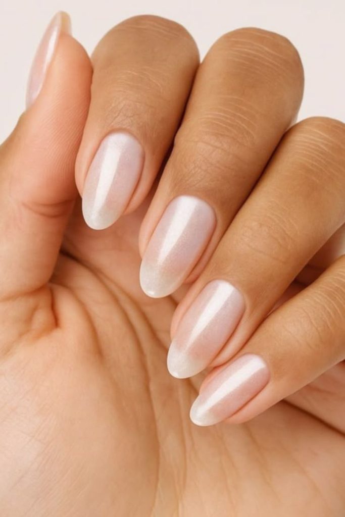 Vanilla pearl chrome elegant nail style.