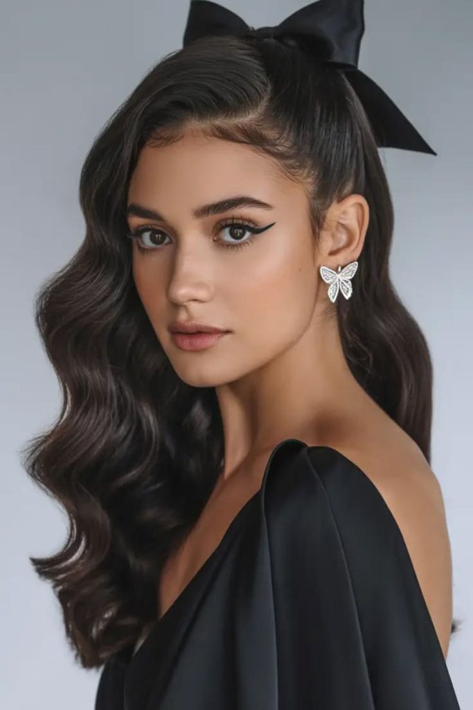 Velvet bow waves with elegant ribbon.