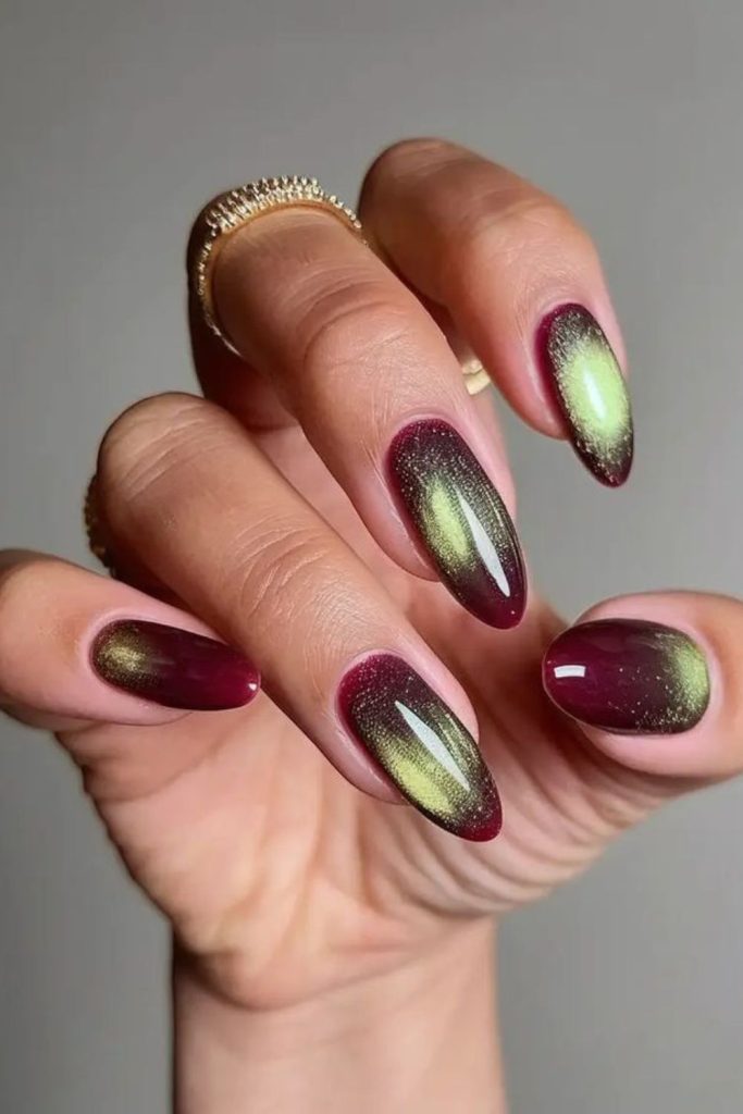 Velvet cat-eye nails with floral accents.