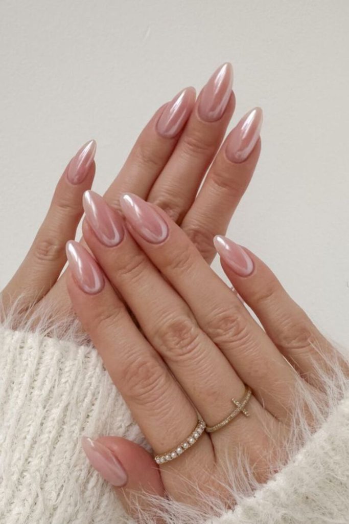 Baby pink mirror glazed nails.