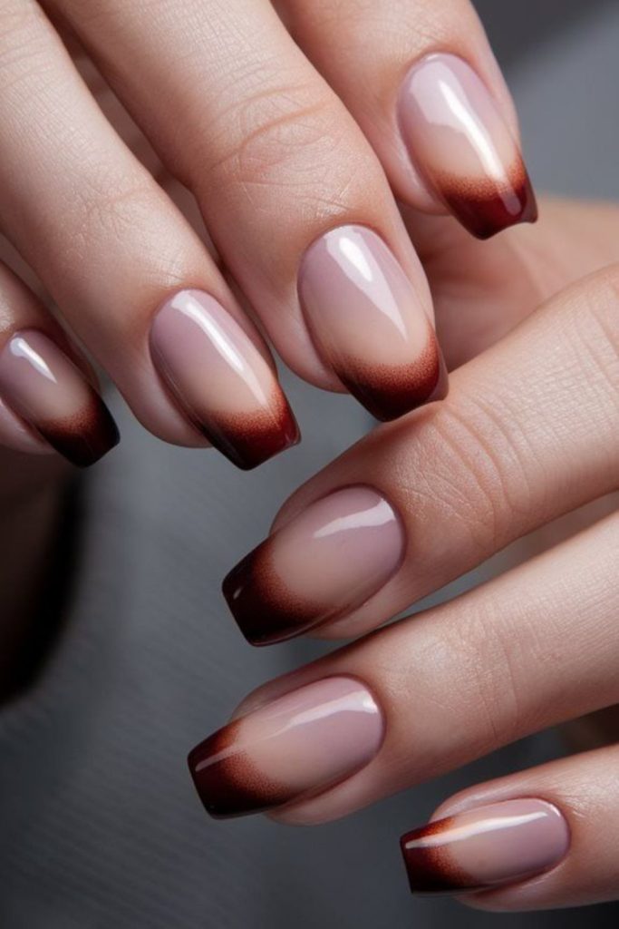 Brown French fade manicure.