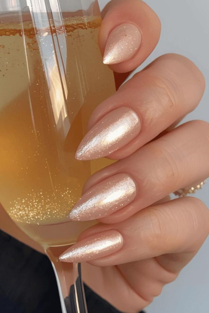 Champagne chrome glazed donut nails.