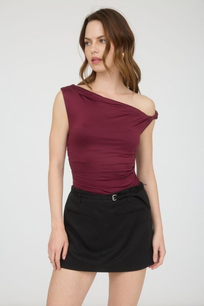 Burgundy off-shoulder crop top outfit.