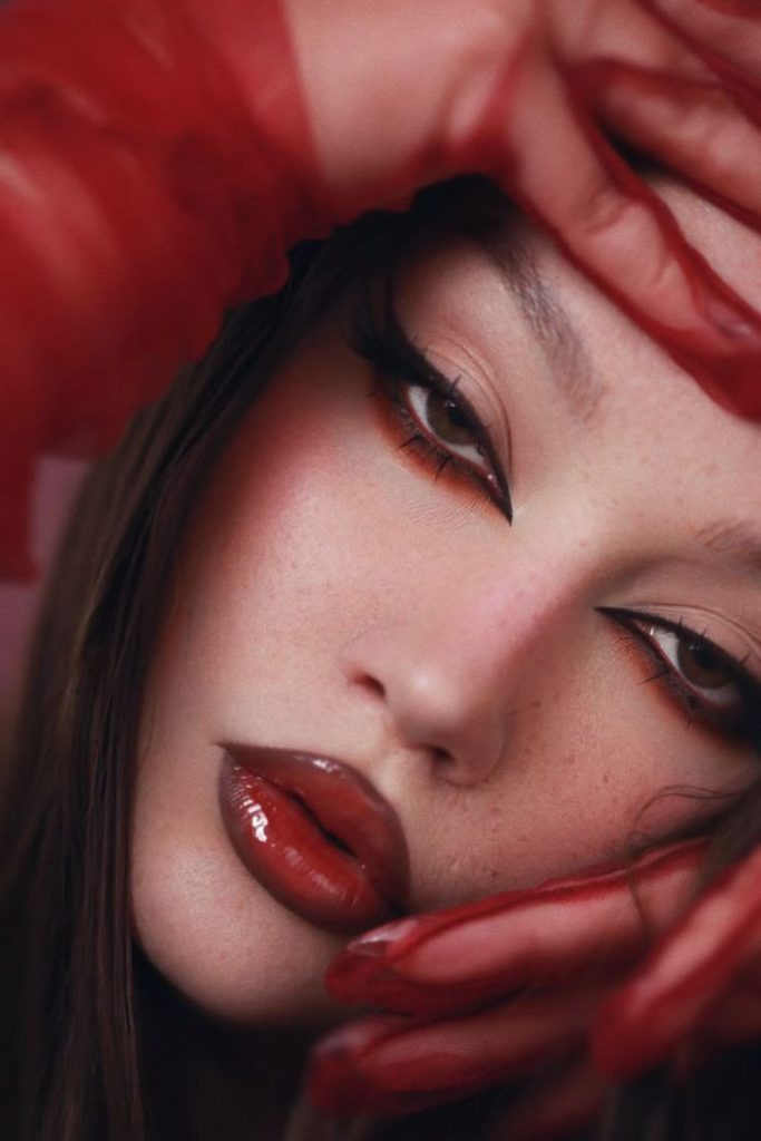 Cherry espresso makeup with smoky brown eyes.