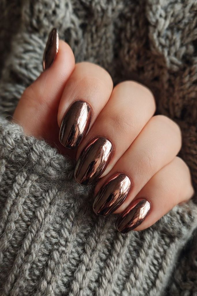 Chocolate chrome mirror manicure.