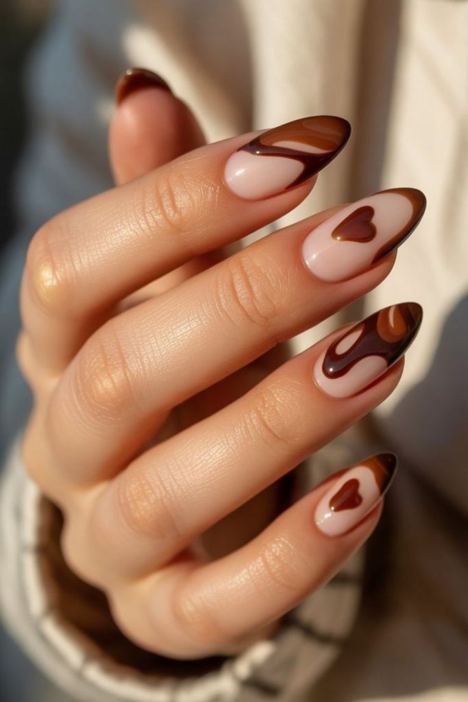 Chocolate negative space manicure.