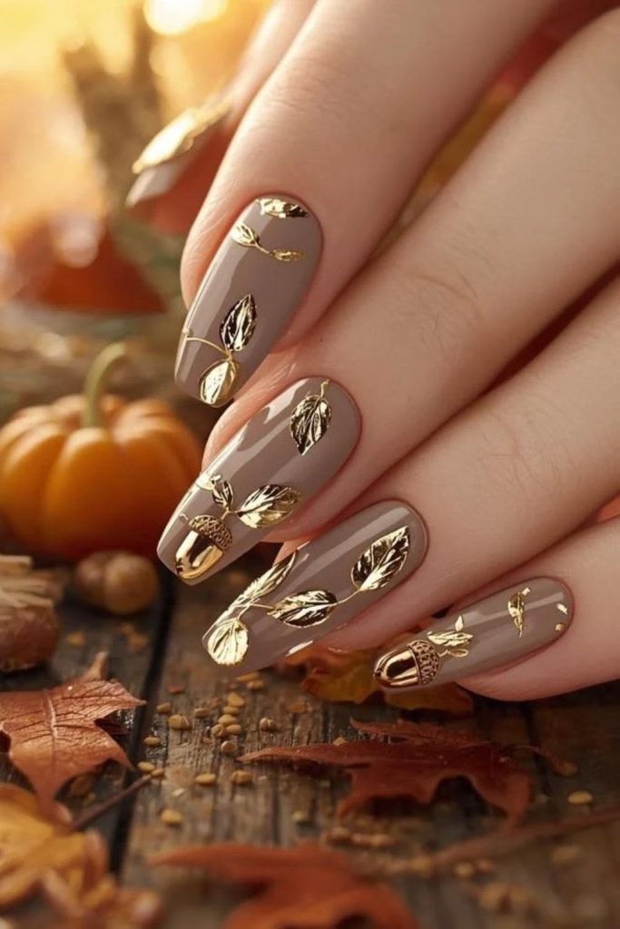 Golden cornucopia Thanksgiving nail art.