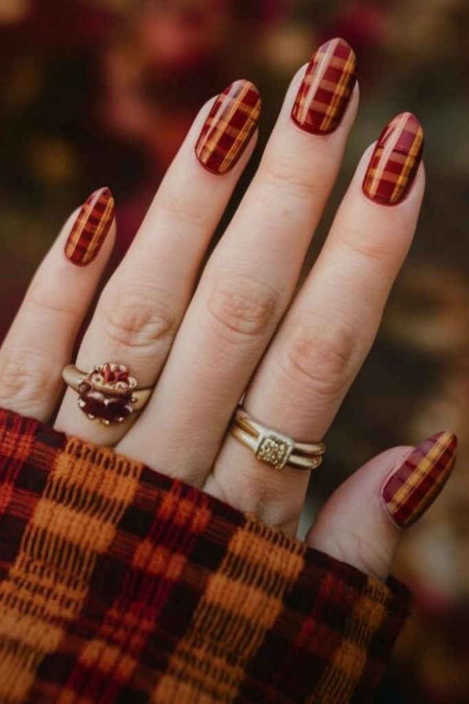 Cozy flannel plaid nail design.