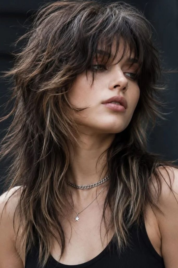 Espresso jellyfish haircut with sleek layers.