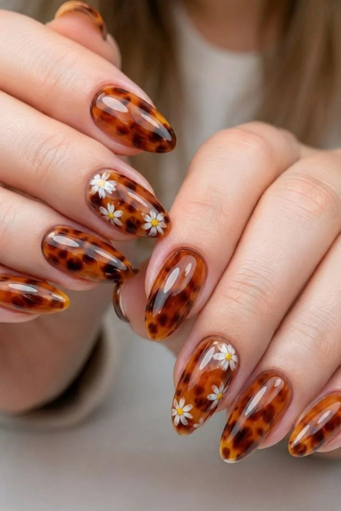 Fireside tortoiseshell Thanksgiving nail design.