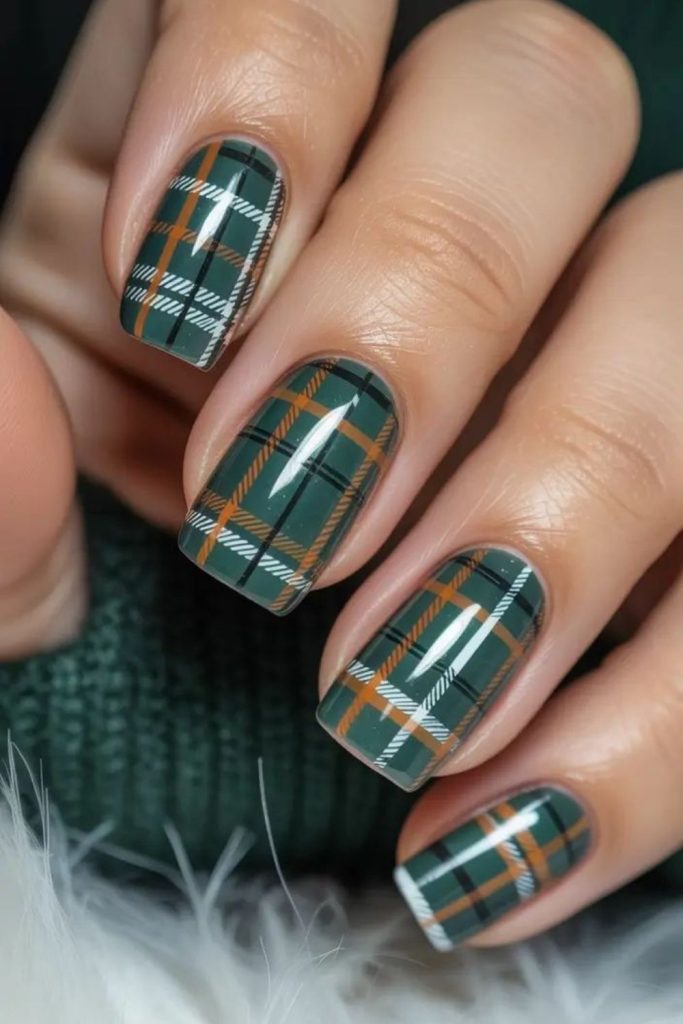 Forest green plaid nail design.