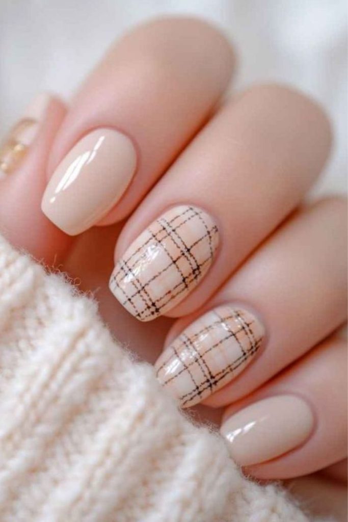 Gold line plaid nail design.