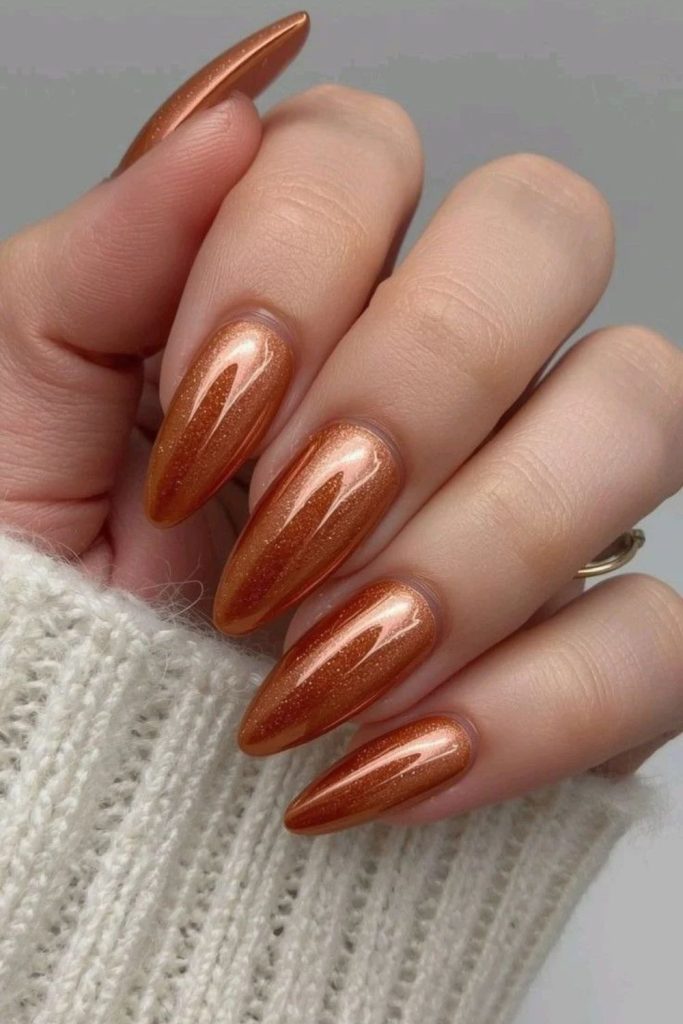 Glazed pumpkin autumn Thanksgiving manicure.