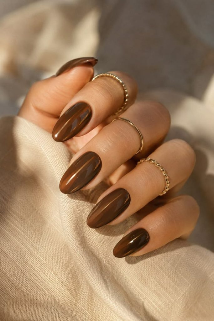 Warm hazelnut glossy brown nails.