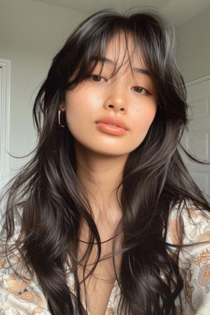 Hush Cut with curtain bangs.