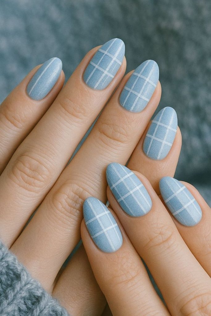 Icy blue plaid nail design.