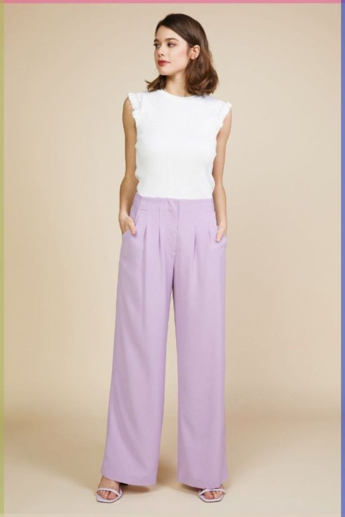 Lavender trousers with white blouse.