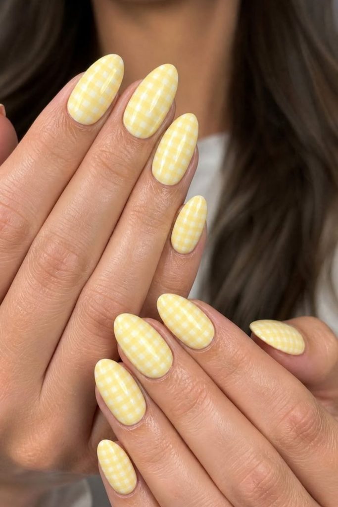 Lemon cream plaid nail design.