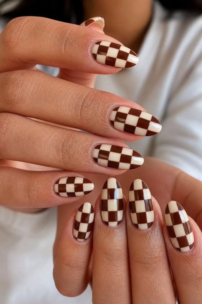 Mocha brown checkered nail design.