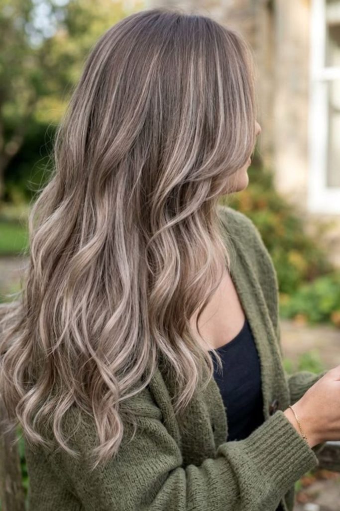 Mushroom brown hair with ash blonde ribbons.