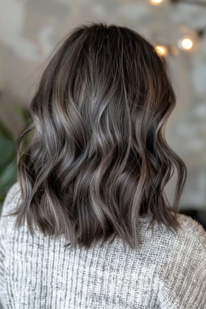 Mushroom brown hair with delicate silver touches.